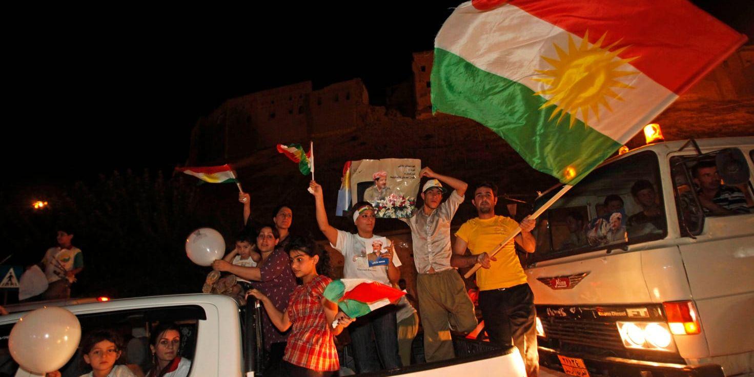 Irakiska kurder firar segern i ett regionalval. Bild:TT
