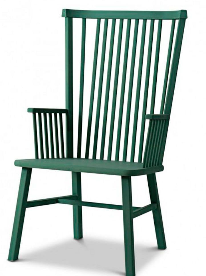 Ida grön - En stol att krypa upp i, med omfamnande uttryck. Väl på plats ger den höga ryggen skydd för insyn