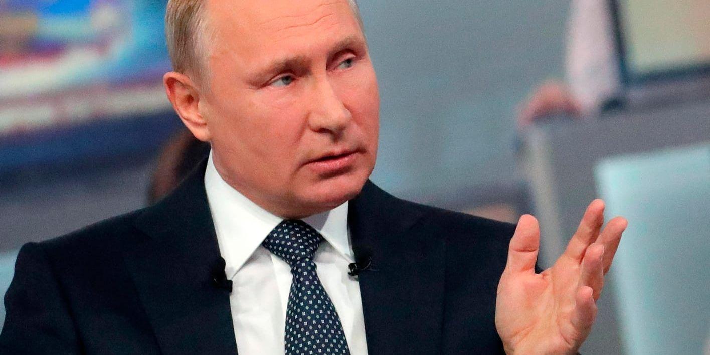 Rysslands president Vladimir Putin under torsdagens telefonväkteri.