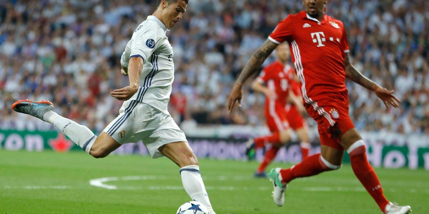 Real Madrids Cristiano Ronaldo, vänster, och Bayern Münchens Jerome Boateng under den rafflande Champions League-kvartsfinalreturen i Madrid i fjol.