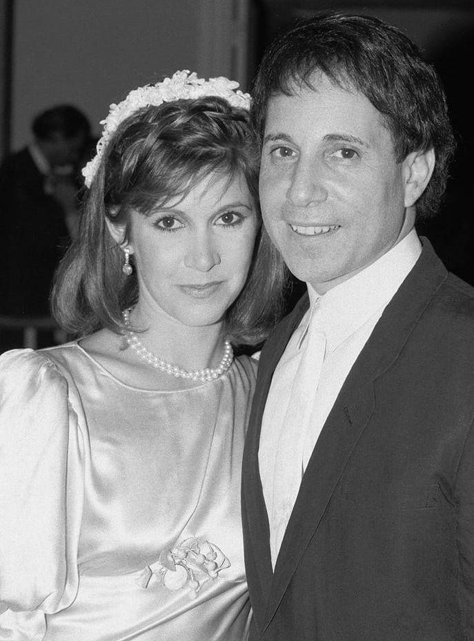 Carrie Fisher var gift med Paul Simon. FOTO: TT