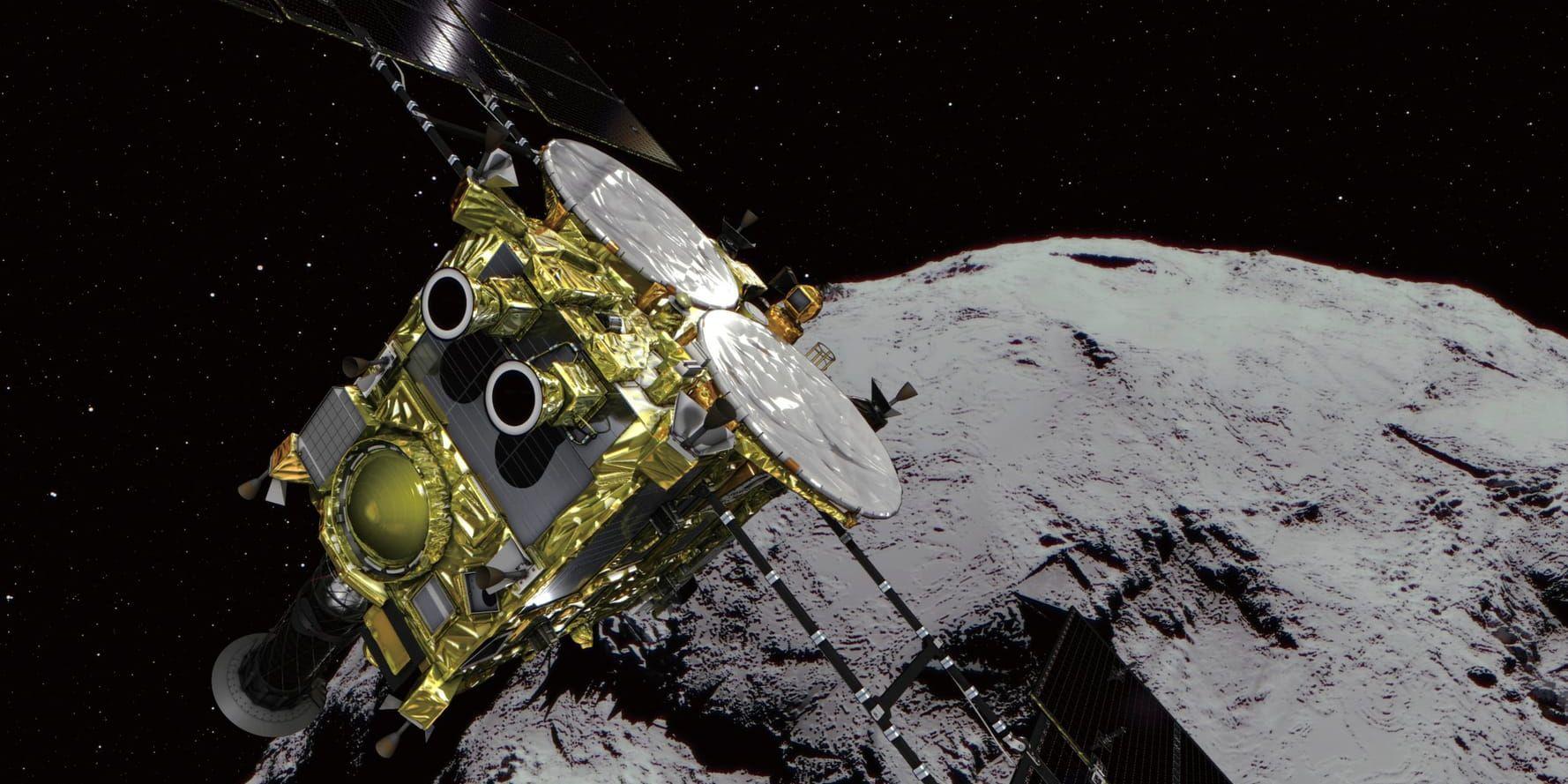 En grafisk framställning från den japanska rymdmyndigheten Jaxa av rymdsonden Hayabusa2 vid en asteroid. Arkivbild.