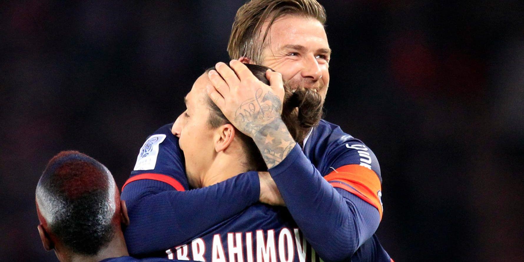 De tidigare lagkamraterna Zlatan Ibrahimovic och David Beckham utmanar varandra på sociala medier om mötet mellan Sverige och England. Arkivbild.