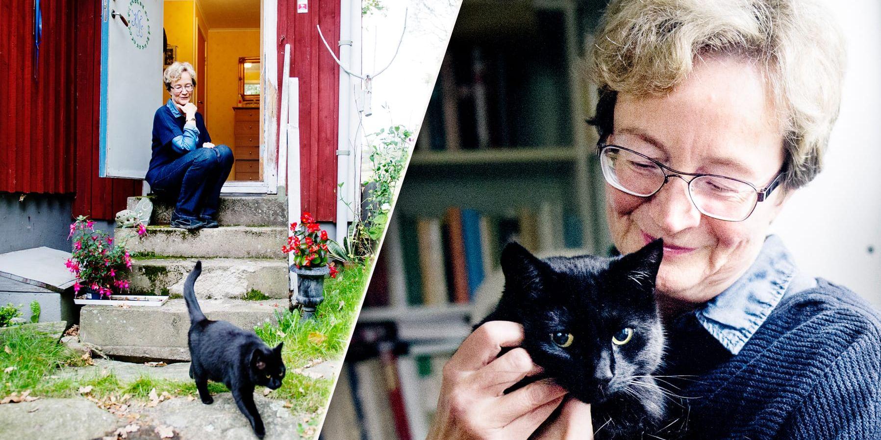 Förbundet. Ellen Mattson och katten Murre är nära varandra, men lever självständiga, parallella liv i huset. Ofta möts de. Som här. Bild: Anna Svanberg
