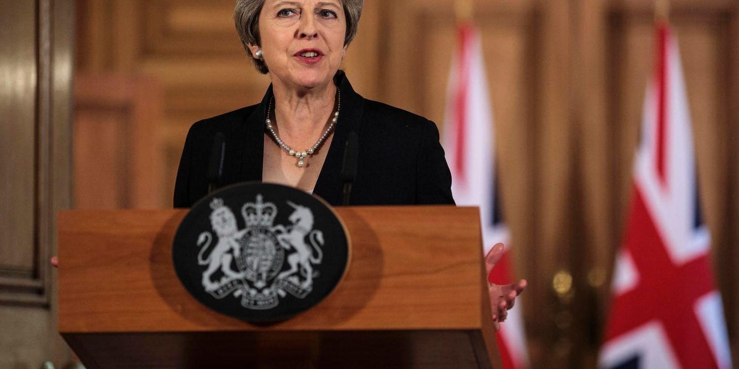Storbritanniens premiärminister Theresa May under talet vid Downing Street i London.
