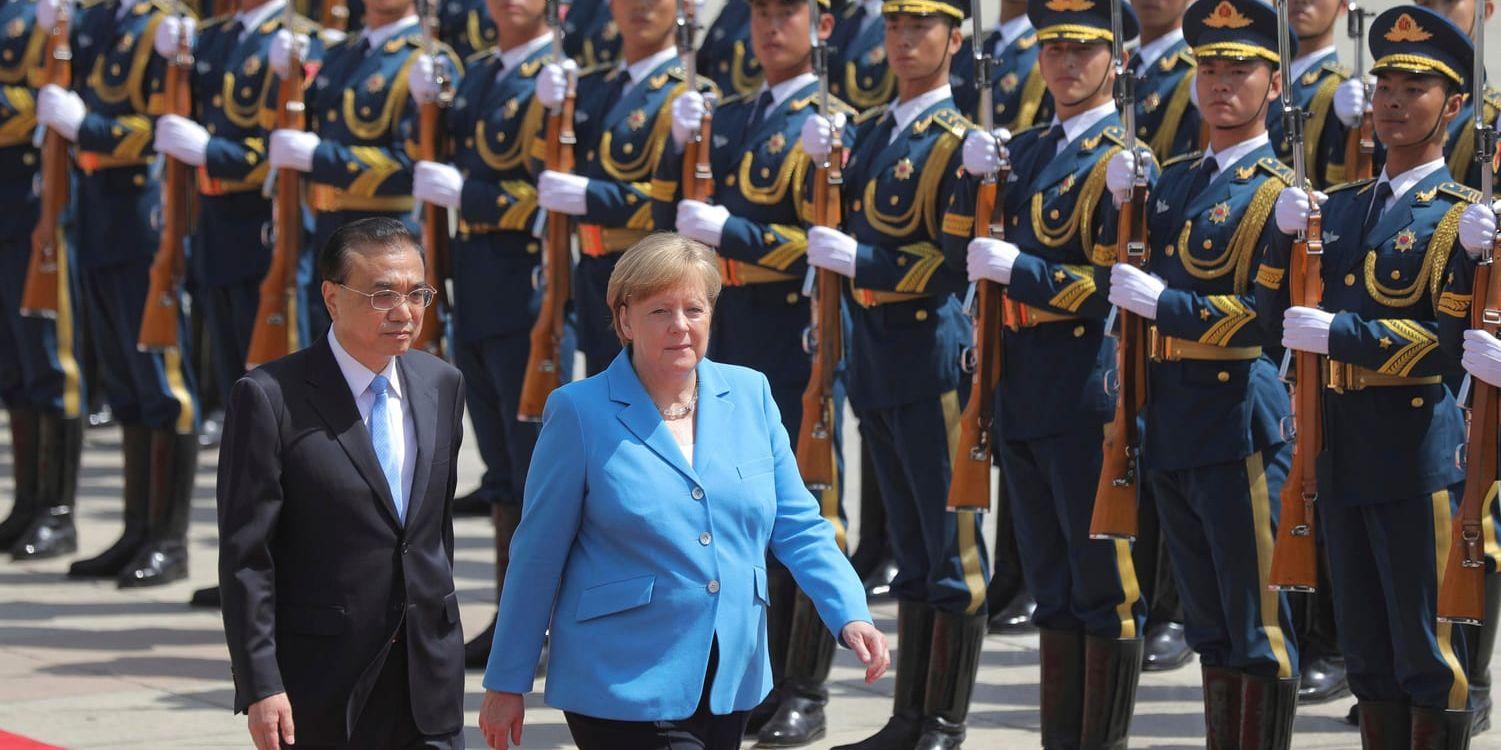 Angela Merkel träffade Li Keqiang i Peking förra veckan. Arkivbild.