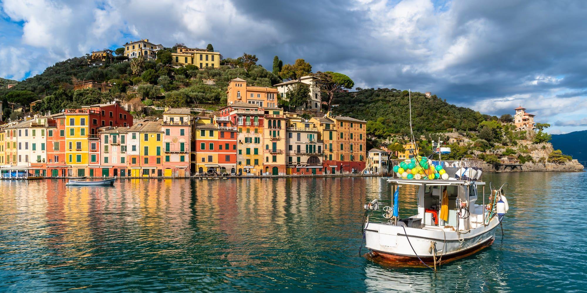 
    Staden Portofino har blivit berömd för sina charmiga hus med gröna fönsterluckor.
   