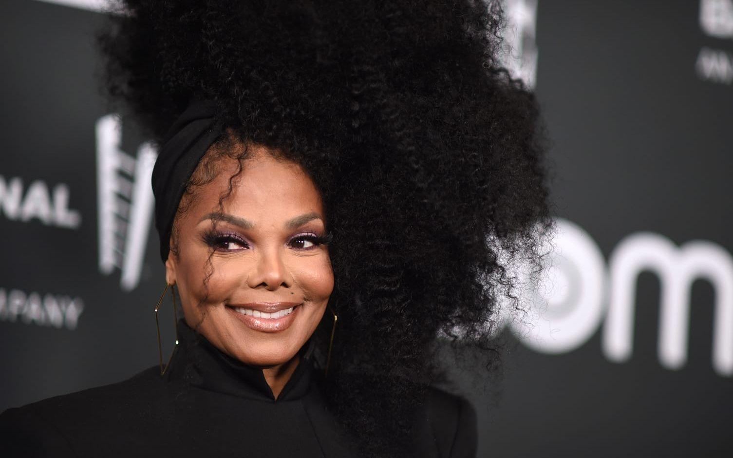 Janet Jackson sällan sig till en exklusiv skara när hon tar emot priset Icon Award på American music awards. Arkivbild.