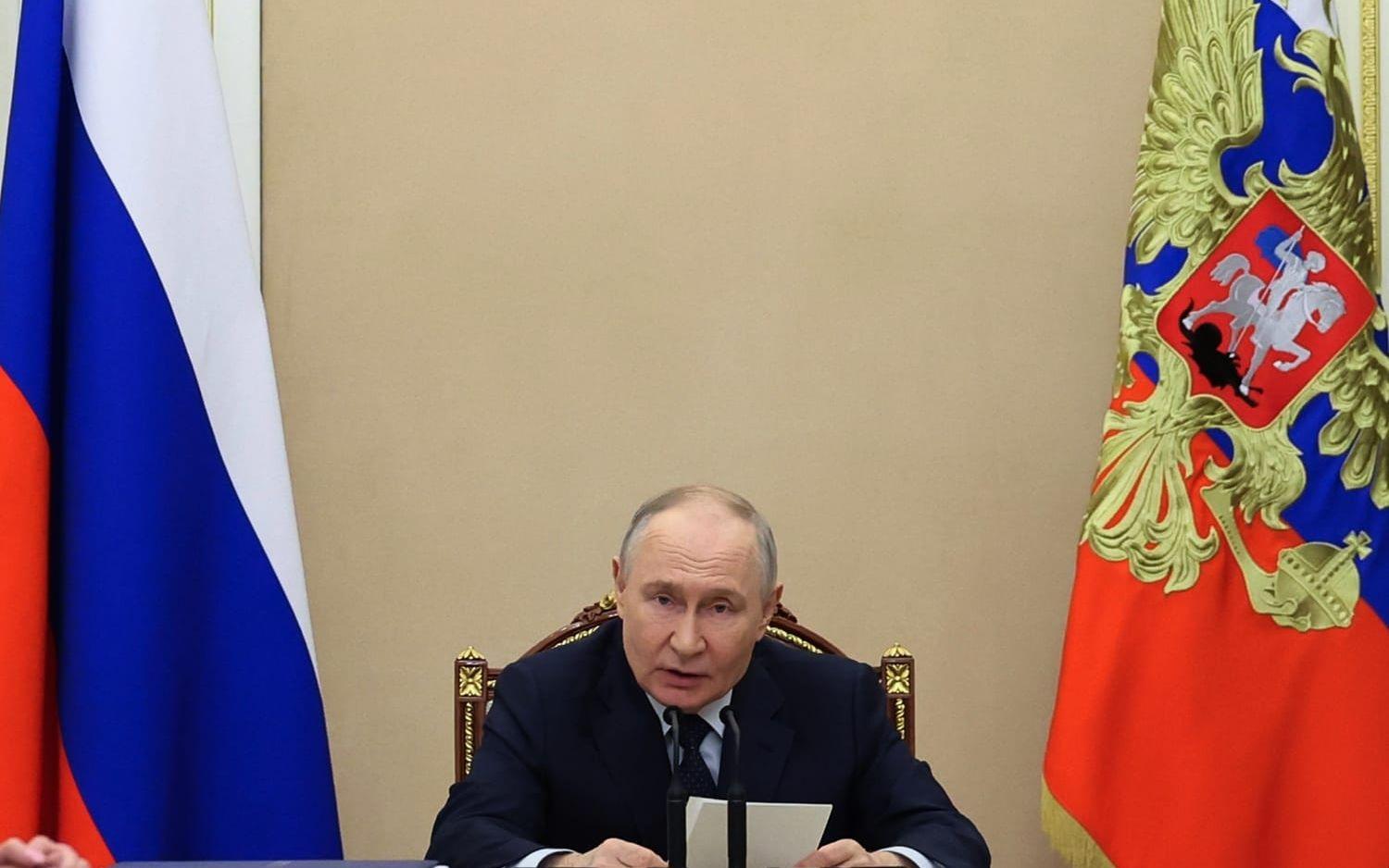 Rysslands president Vladimir Putin under ett regeringssammanträde om ekonomiska frågor på onsdagen. 