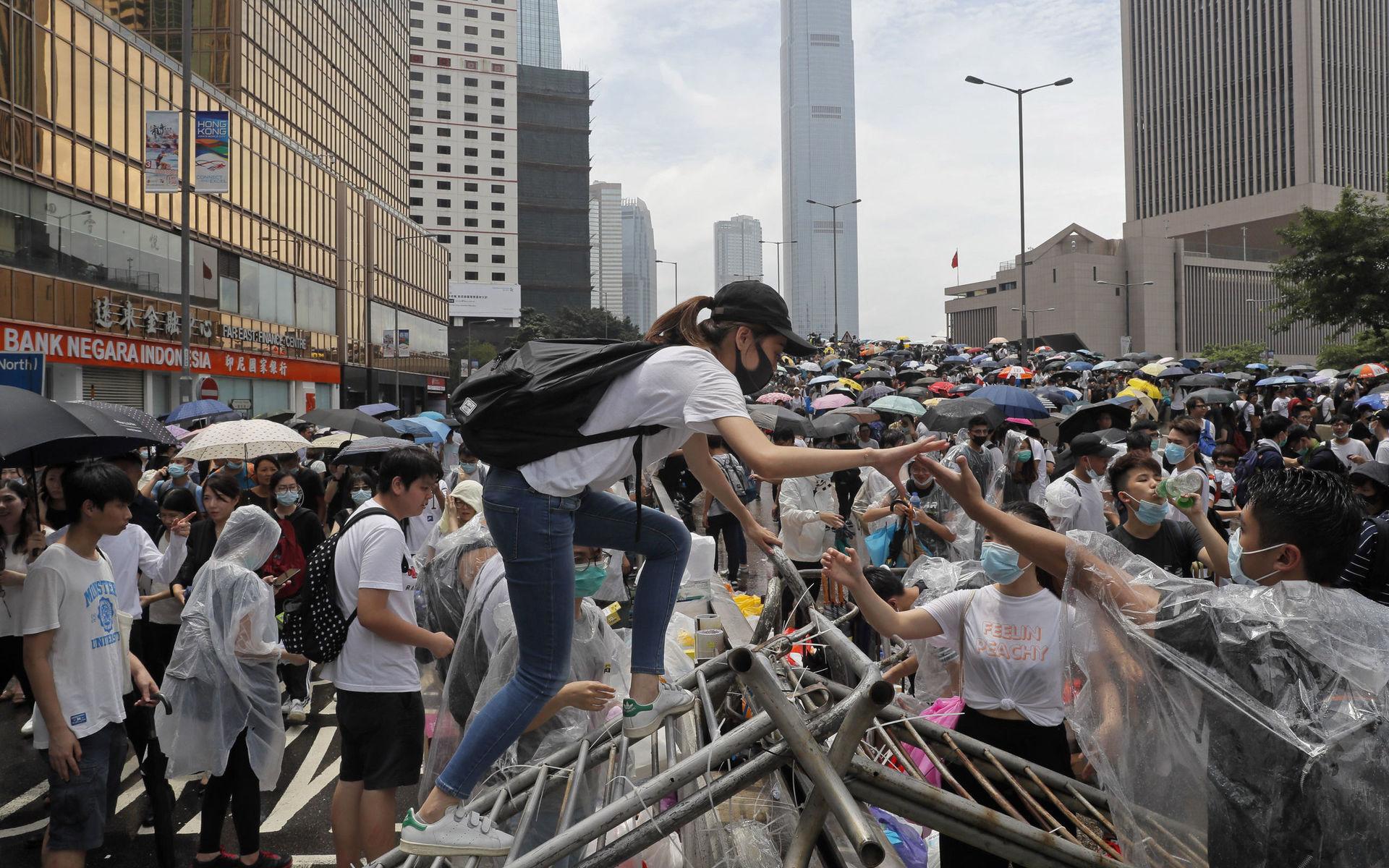 In this June 12, 2019, file photo, protesters gather near the Legislative Council in Hong Kong. (AP Photo/Kin Cheung, File)