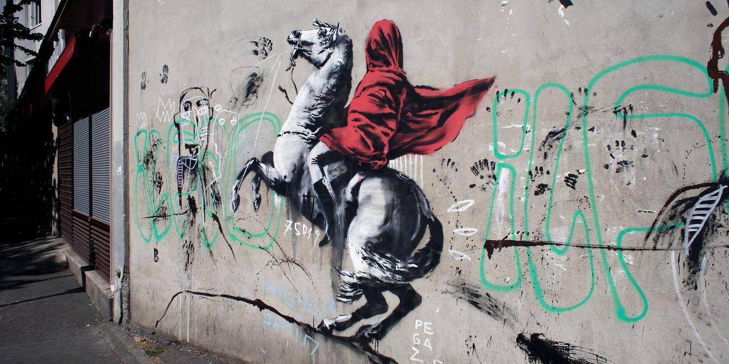 Ett graffitiverk av gatukonstnären Banksy i Paris. Arkivbild.