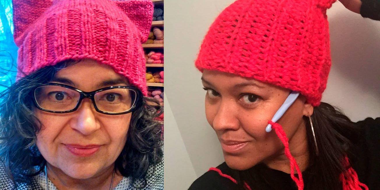 Angie Paulson (till vänster) och Crystal Howard visar upp sina rosa mössor inför kvinnomarschen i Washington DC.