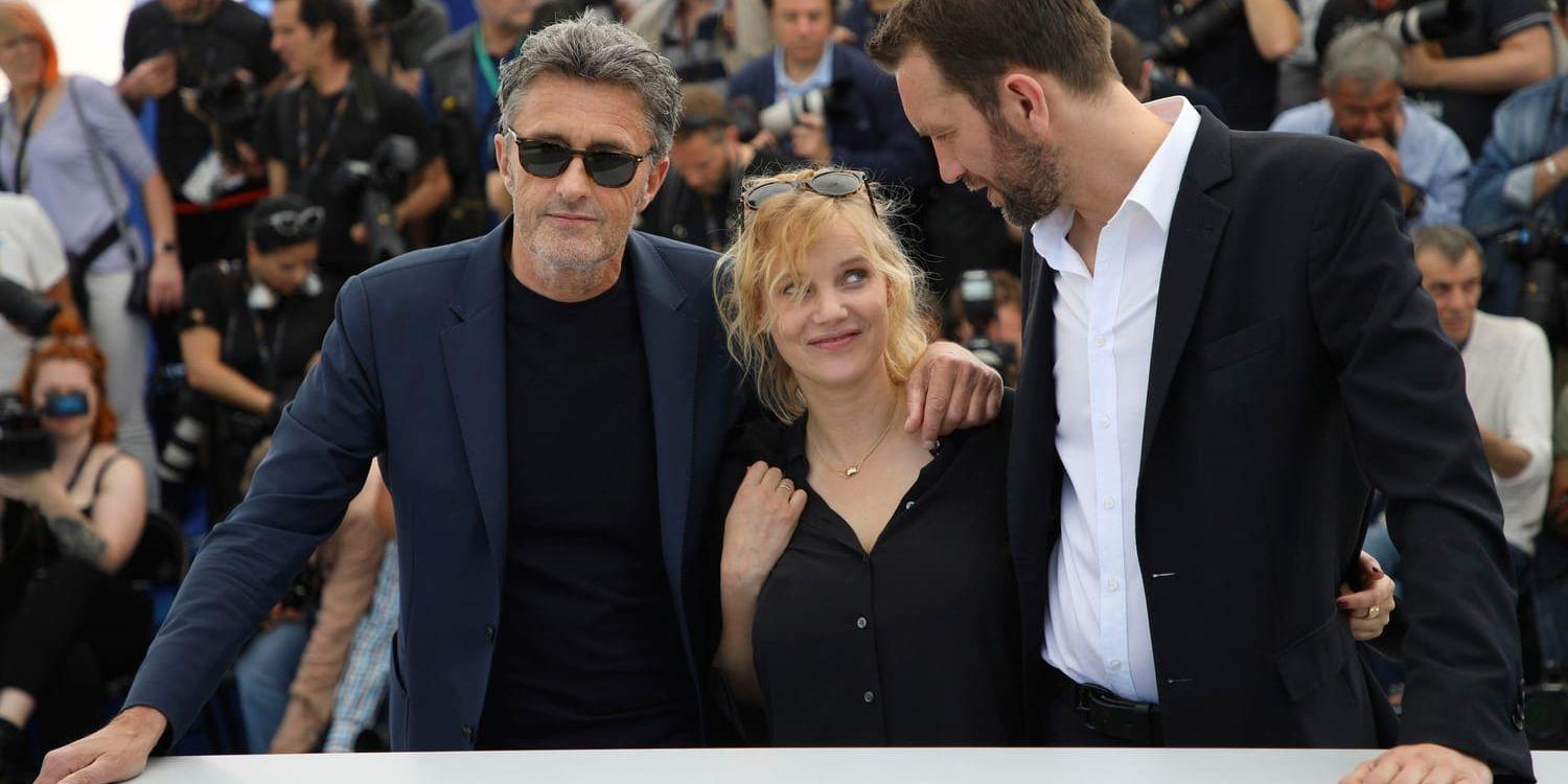 Pawel Pawlikowski, Joanna Kulig och Tomasz Kot i Cannes där filmen hyllades stort. "Det väckte sådana oerhörda känslor", säger Kulig till TT. Arkivbild.