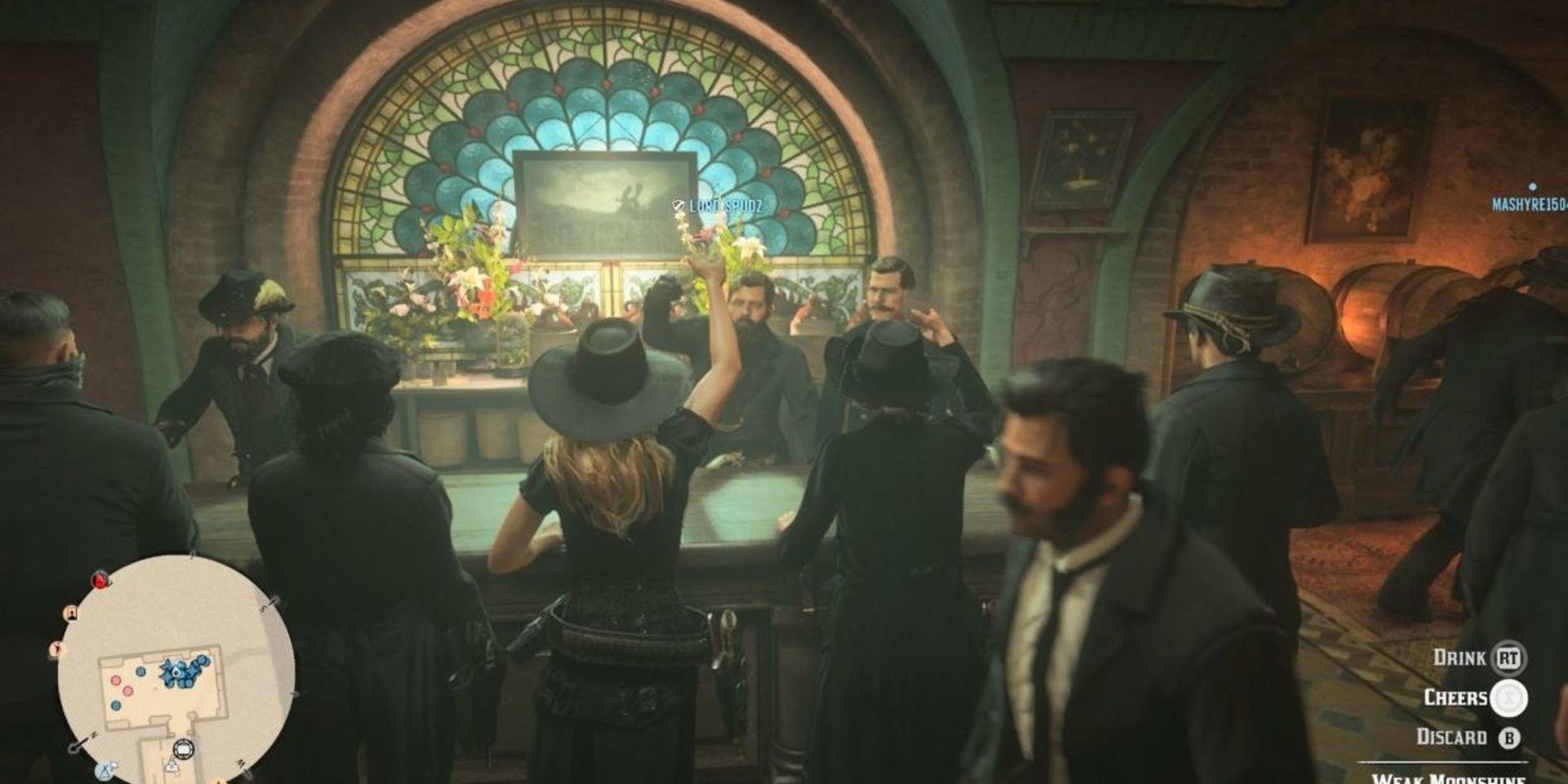 Flera spelare samlades på en pub inne i spelet för att tillsammans utbringa en skål för det ”döende spelet” Foto: Print screen från Red Dead Online