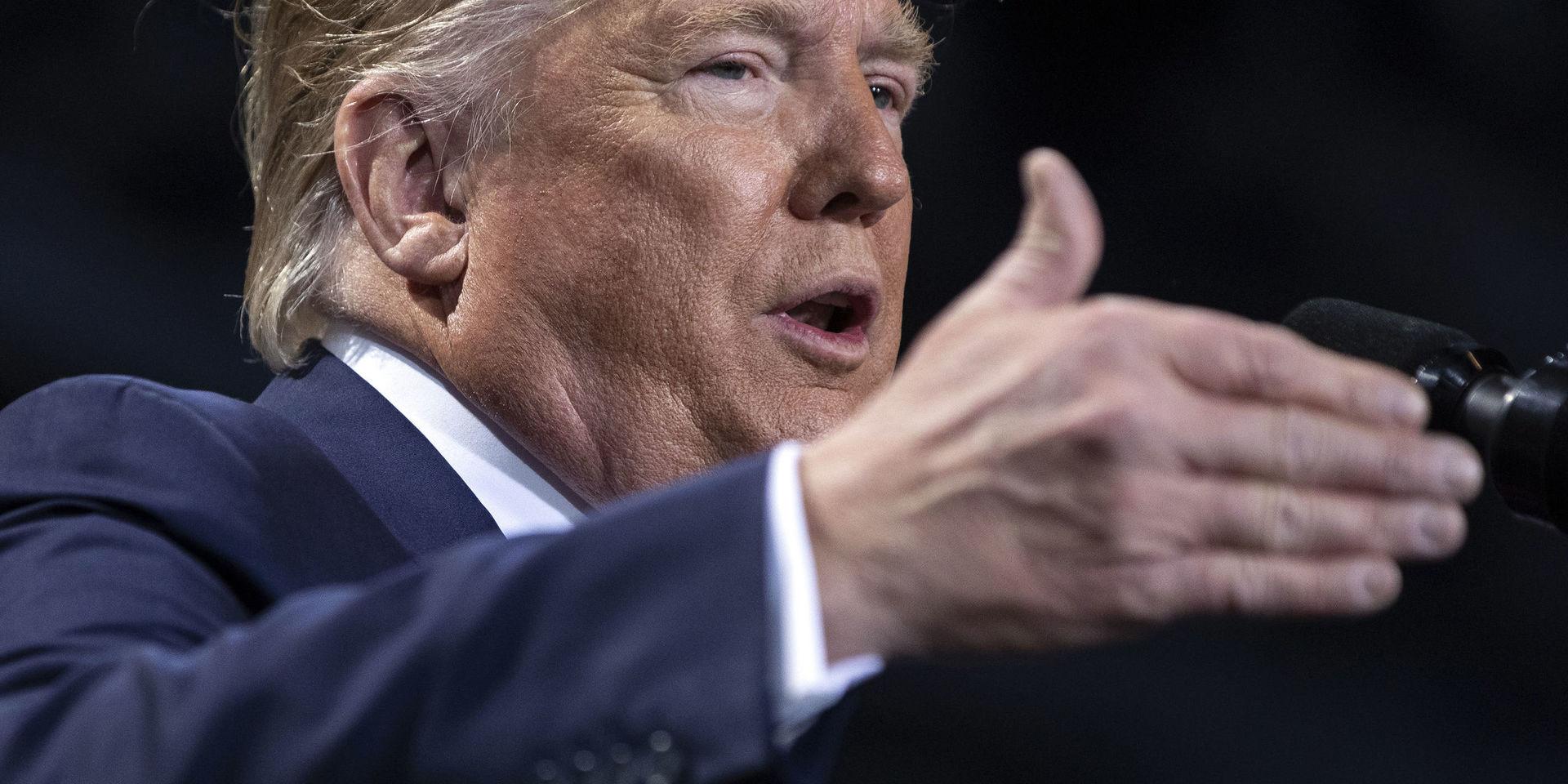 USA:s president Donald Trump höll kampanjmöte i Michigan medan representanthuset röstade för att ställa honom inför riksrätt.