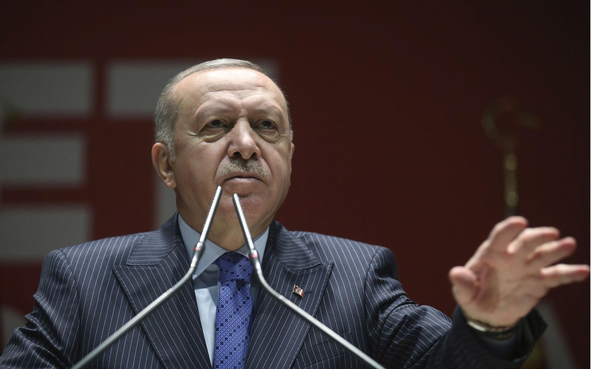 Turkish President Recep Tayyip Erdogan speaks to his ruling party members, in Ankara, Turkey, Thursday, Feb. 27, 2020. Erdogan said Thursday that fighting in northwest Syria had swung in favor of Turkey and the opposition forces it supports. (Presidential Press Service via AP, Pool)  ANK102
