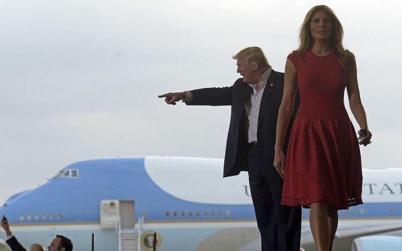 Trump tillsammans med sin fru Melania Trump. Bild: TT