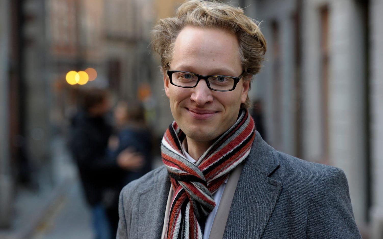 Bokförläggaren Kristoffer Lind på bokförlaget Lind & Co. Arkivbild.