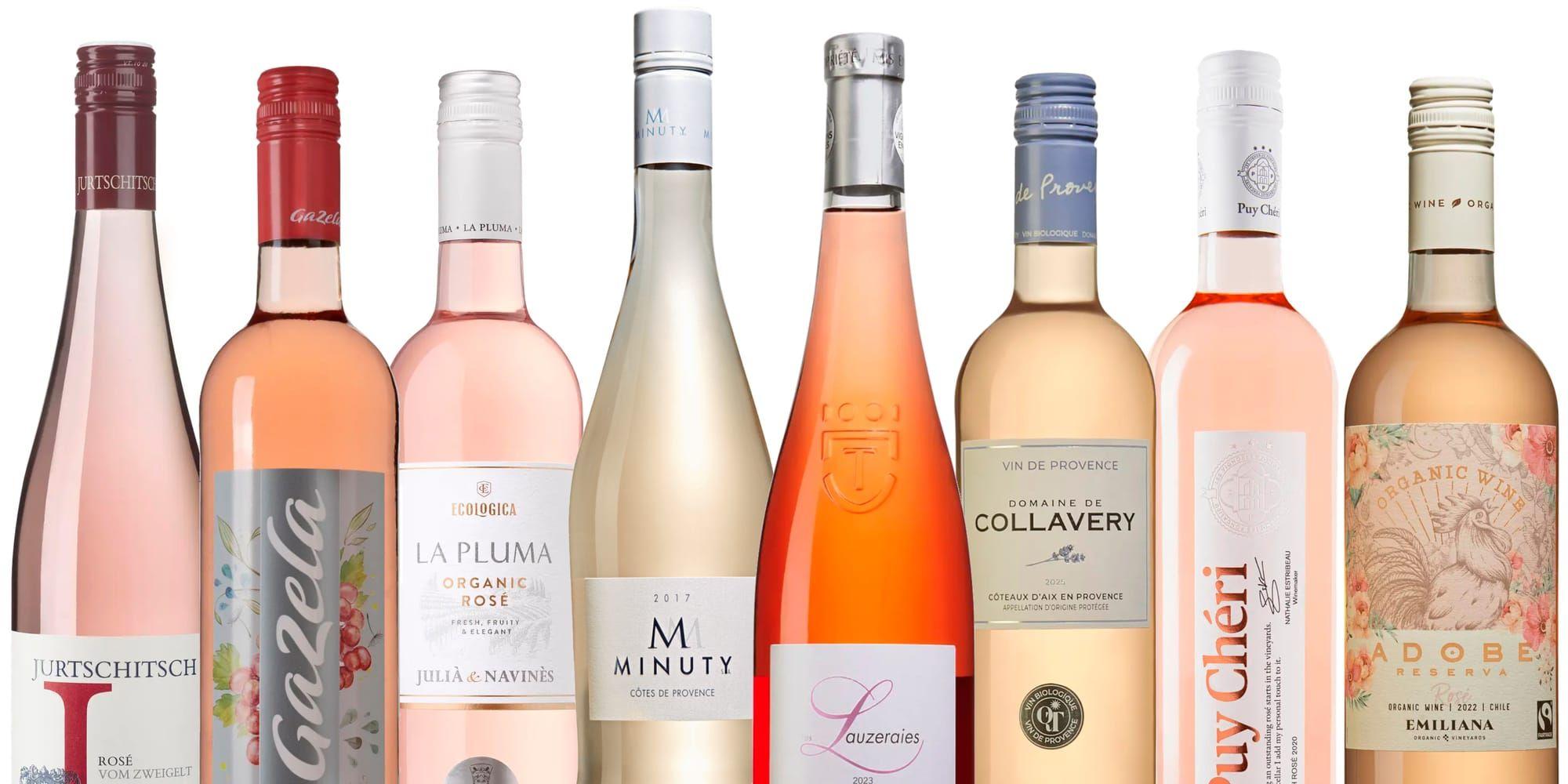 Åtta flaskor rosévin i varierande nyanser.