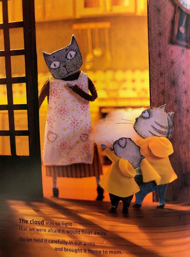 Illustration ur Baek Heenas genombrottsbok &quot;Molnbullar&quot;. Här syns de två små katterna som hittat ett moln, som deras mamma sedan bakar bullar av. Bullar som kan flyga.