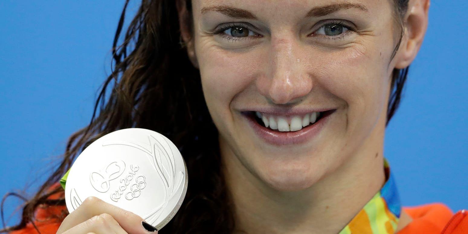 När den ungerska simmerskan Katinka Hosszy vann OS-guld var det i första han hennes man samt tränare som fick hyllades av en sportkommentator. Foto: TT