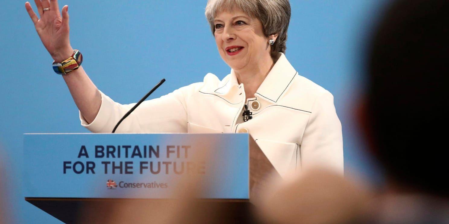 Storbritanniens premiärminister Theresa May under ett tal inför konservativa Tories partisammanträde i London under lördagen.