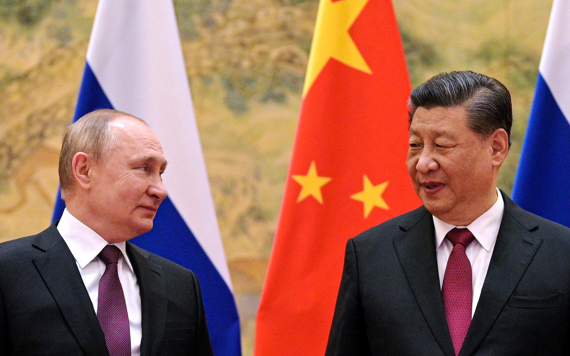 Vladimir Putin och Kinas ledare Xi Jinping i ett möte i samband med OS i februari.