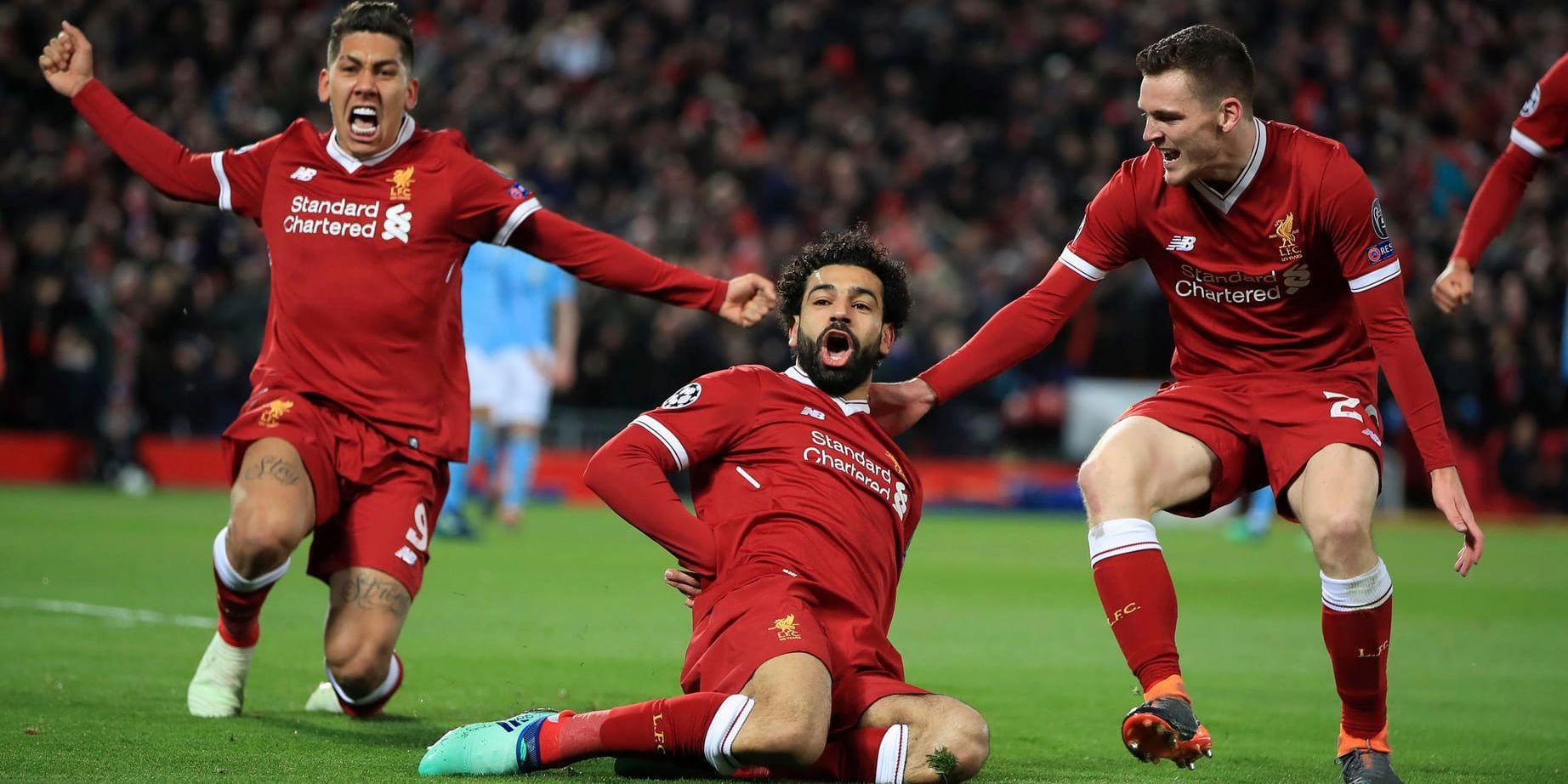 Liverpools Mohamed Salah (mitten) firar 1–0-målet mot Manchester City.