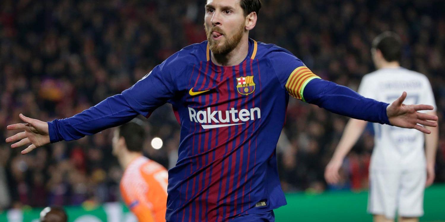 Barcelonas Lionel Messi jublade efter sitt 3–0-mål, argentinarens 100:e i Champions League, i hemmamötet med Chelsea på Camp Nou.