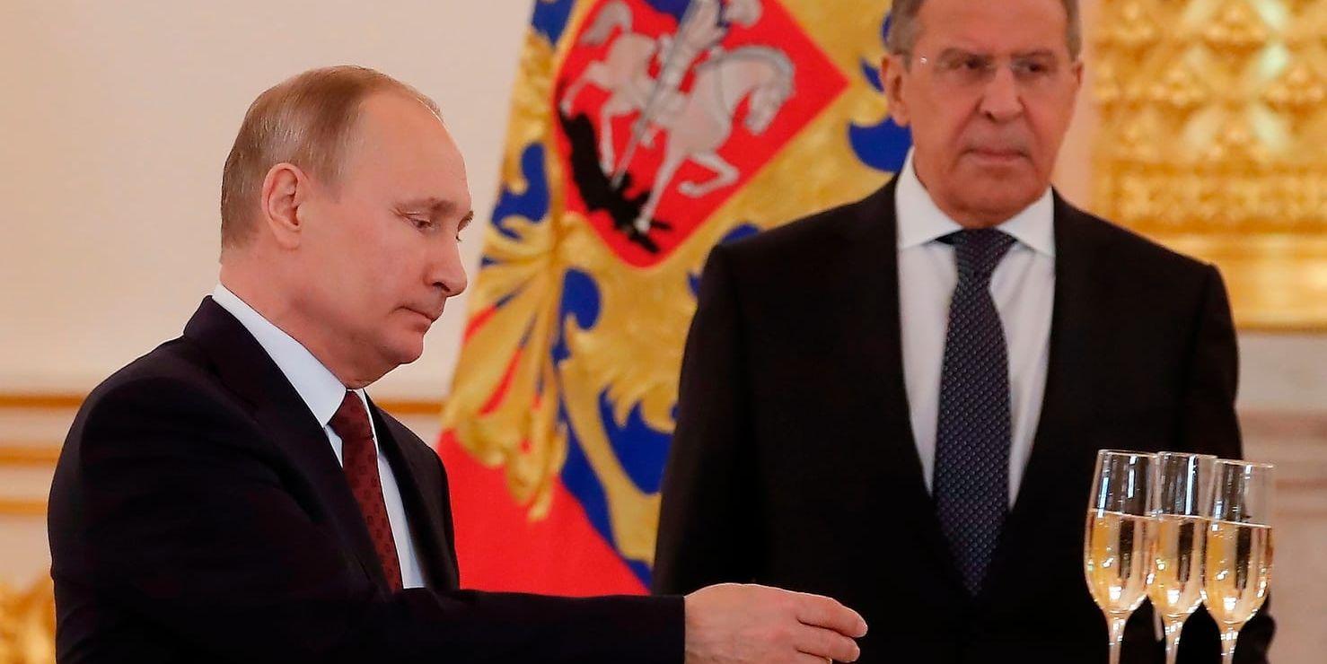Rysslands president Vladimir Putin och utrikesminister Sergej Lavrov. Arkivbild.