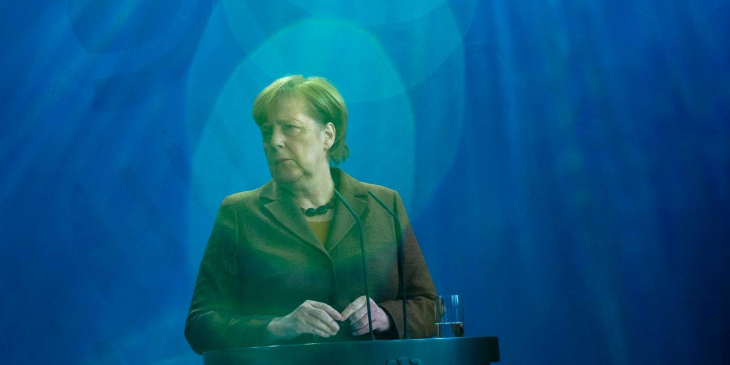 Det tyska socialdemokratiska partiet SPD har röstat för en ny stor regeringskoalition med förbundskansler Angela Merkels kristdemokrater. Arkivbild.