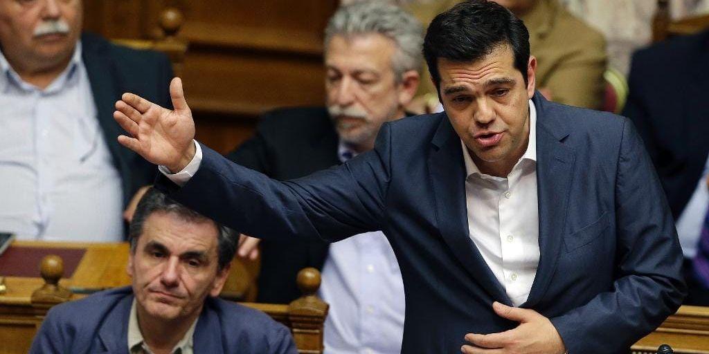 Greklands premiärminister Alexis Tsipras talade i parlamentet under den stormiga debatten som föregick nattens beslut att säga ja till åtgärdspaketet som landets långivare krävt.