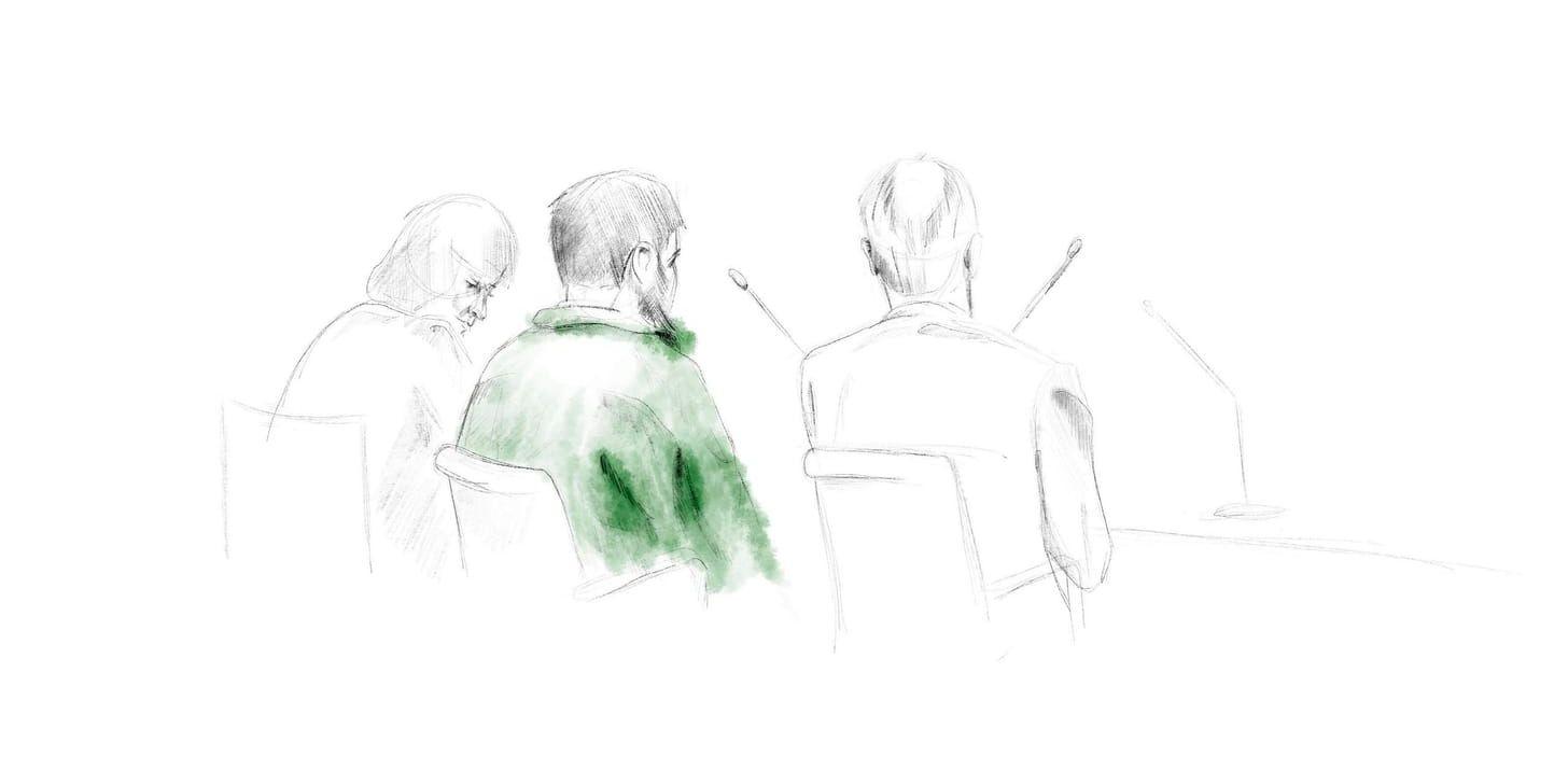 Terroråtalade Rakhmat Akilov (i grön jacka) under förhandlingen i Stockholms tingsrätt. Arkivbild.