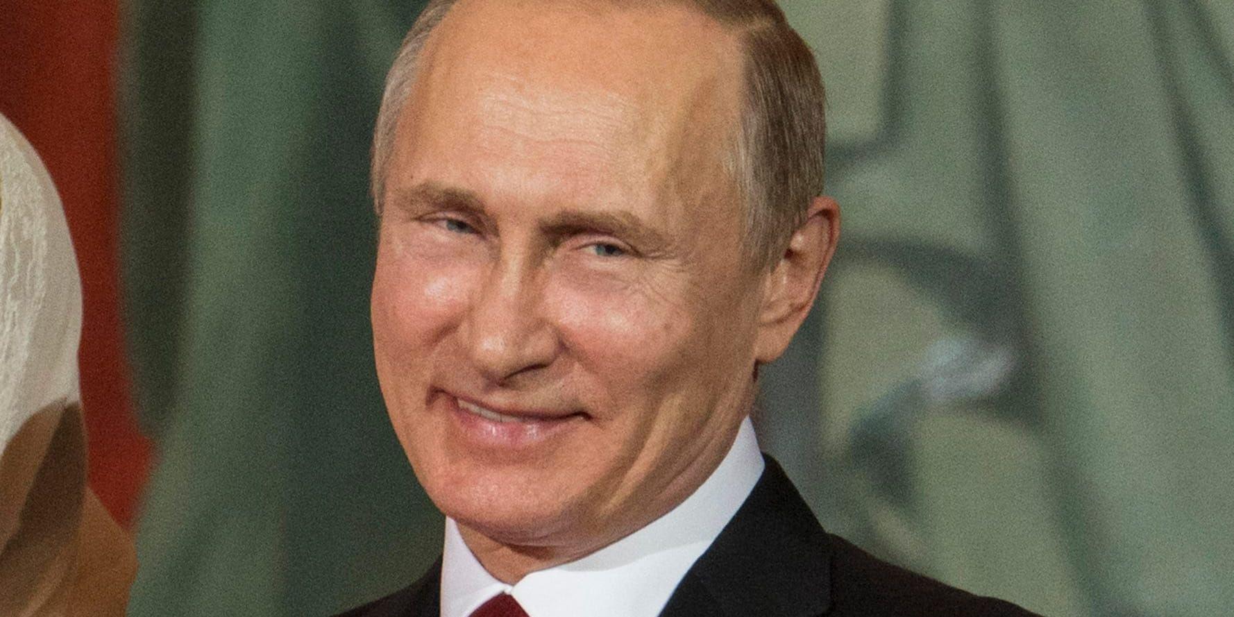 Rysslands president Vladimir Putin kan inför valet i mars nästa år glädjas åt positiva ekonomiska utsikter. Arkivbild.