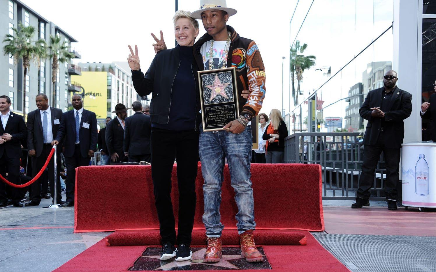 Ellen DeGeneres tillsammans med Pharrell Williams 2014. Bild: Richard Shotwell