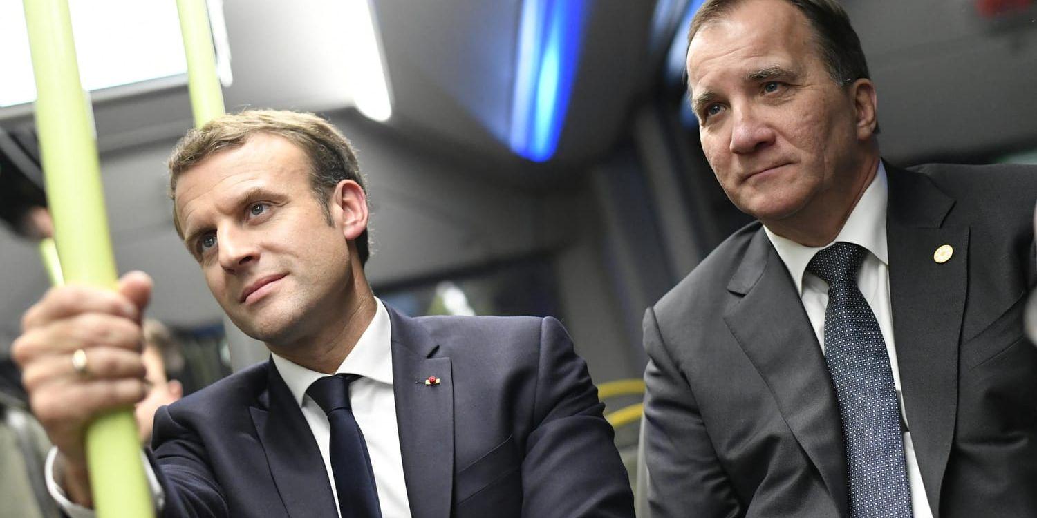 Frankrikes president Emmanuel Macron och statsminister Stefan Lofven åker eldriven buss på väg till en presskonferens efter EU-toppmötets slut.