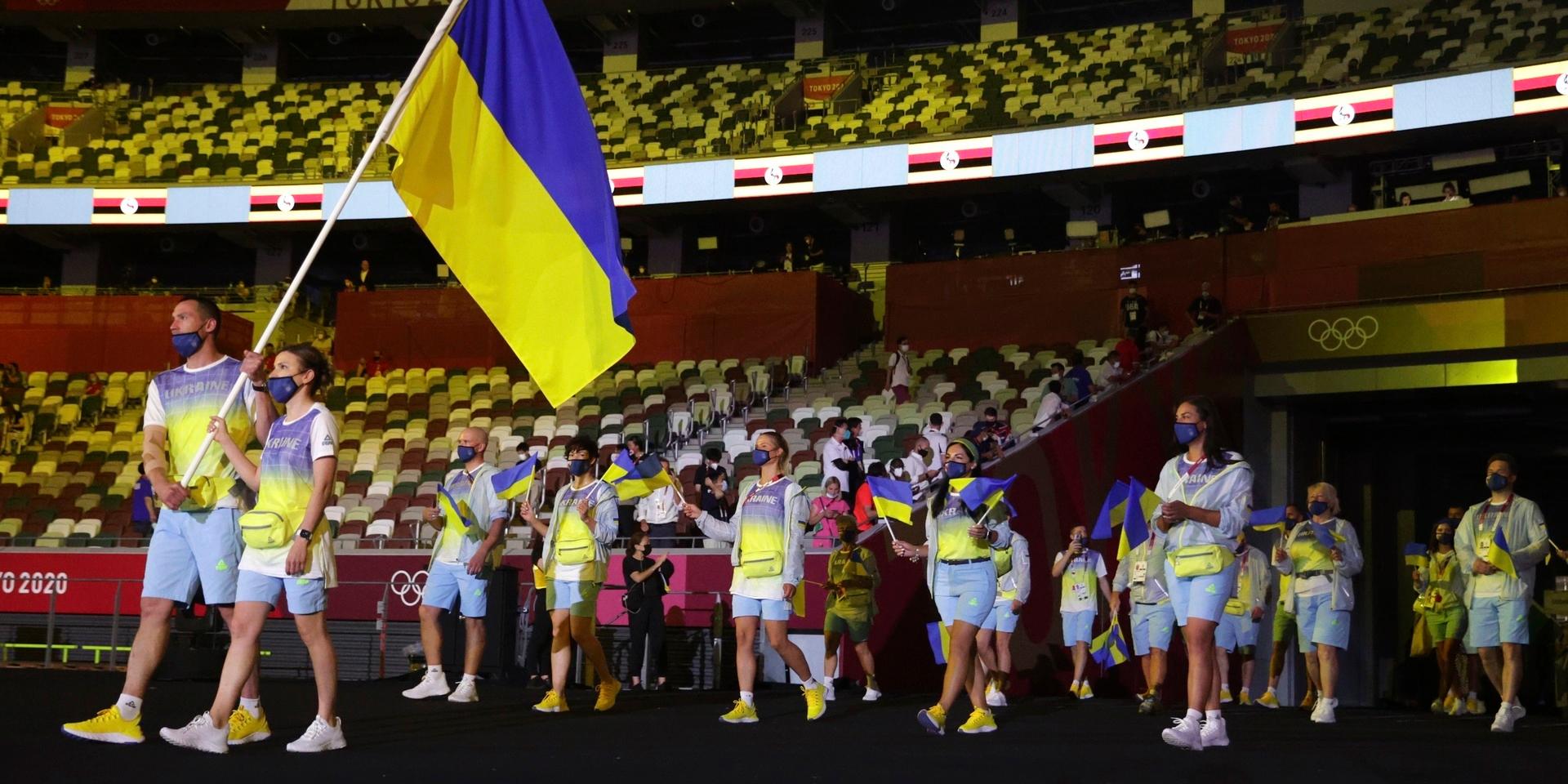 När Ukrainas idrottare gick in under OS-invigningen visade sydkoreansk tv bilder på kärnkraftverket i Tjernobyl.