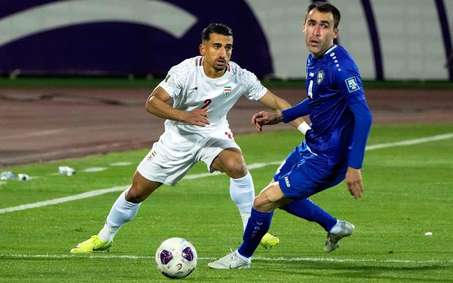 Farrukh Sayfievs (till höger) och hans Uzbekistan är klart för fotbolls-VM.