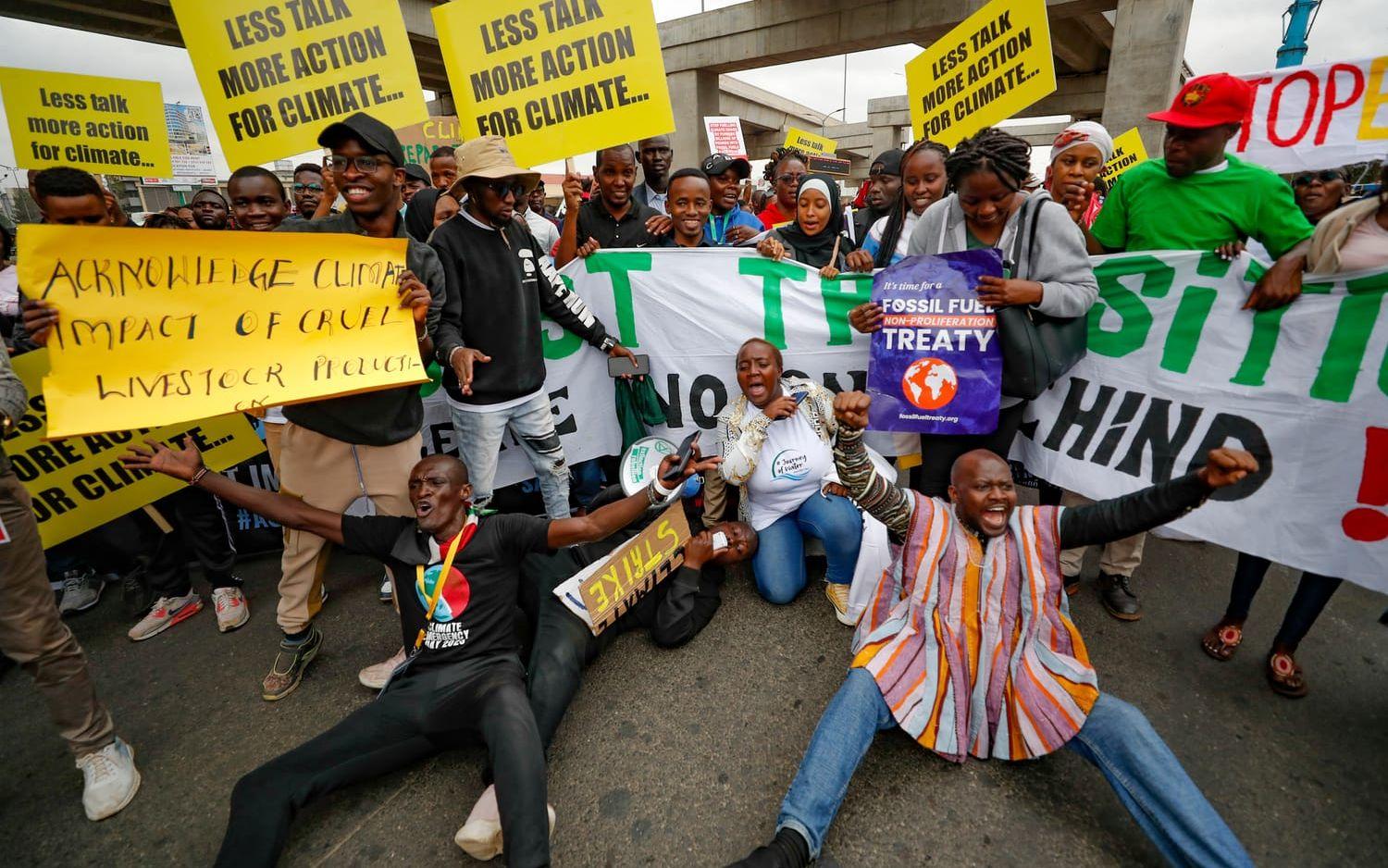 Demonstranter i Nairobi kräver handling i kampen mot klimatförändringarna.