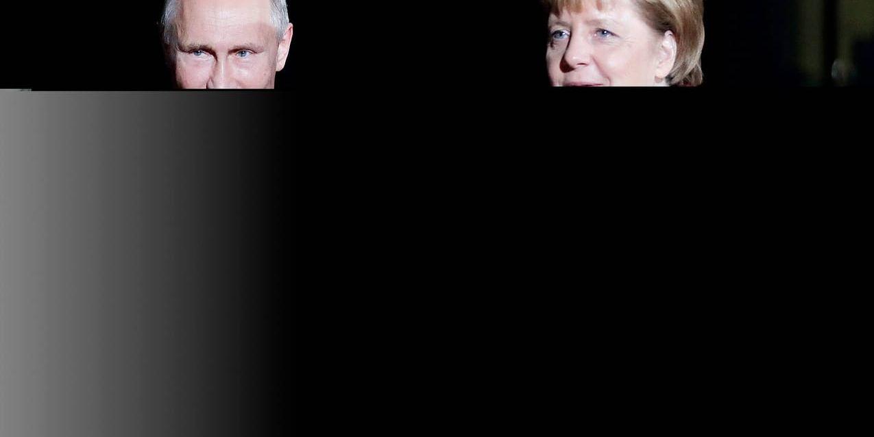 Vladimir Putin och Angela Merkel. Arkivbild.
