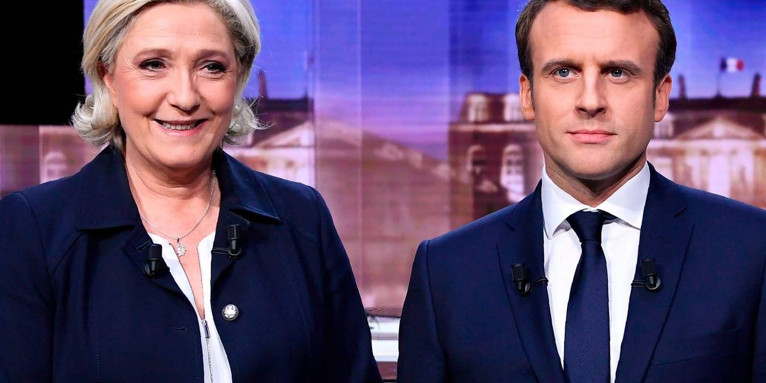 Emmanuel Macron och Marine Le Pen inför debatten i La Plaine-Saint-Denis på onsdagskvällen.