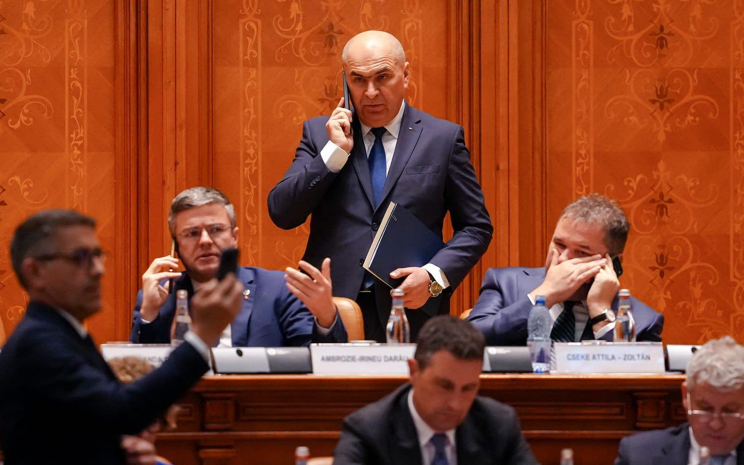 Ilie Bolojan i parlamentet i Bukarest på tisdagen.